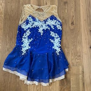 Women’s gorgeous blue and white figure skating dress